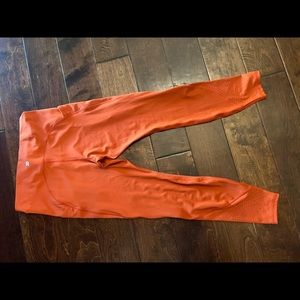 All in motion Orange leggings. Size Medium with pockets